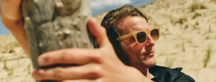 looking at the sky through sunglasses